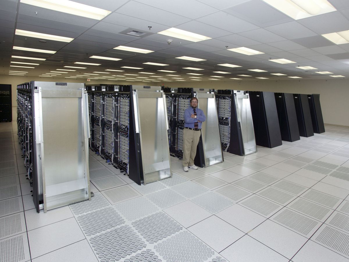 The IBM Blue Gene/L machine room, rows of racks with a person for scale